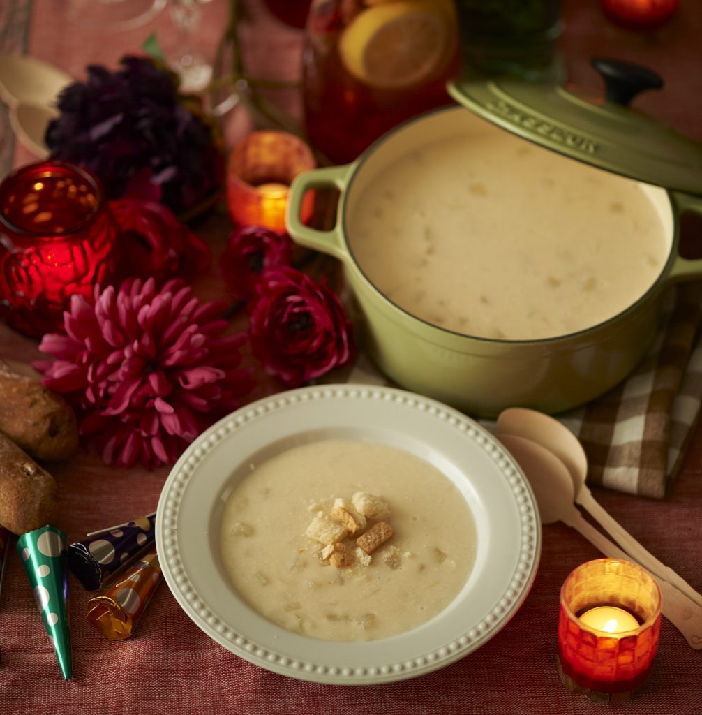 Top your potato soup with sour cream, cheddar, and cilantro.